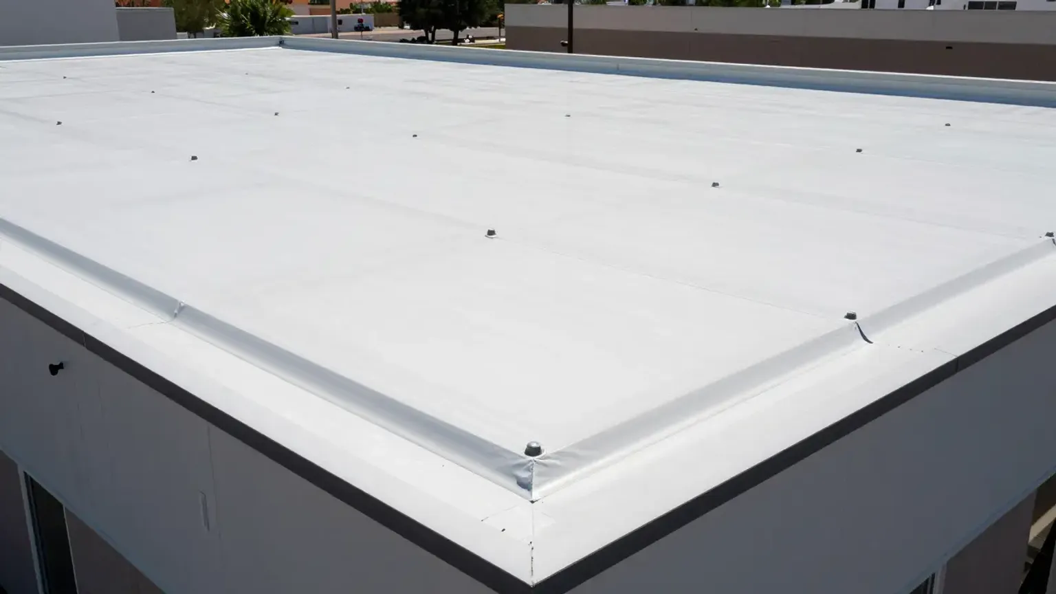 Flat roof repair on a Taylorsville Utah commercial property with membrane repair and drain clearing